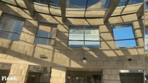 A reconstruction of a building becomes more complete as new views are generated.